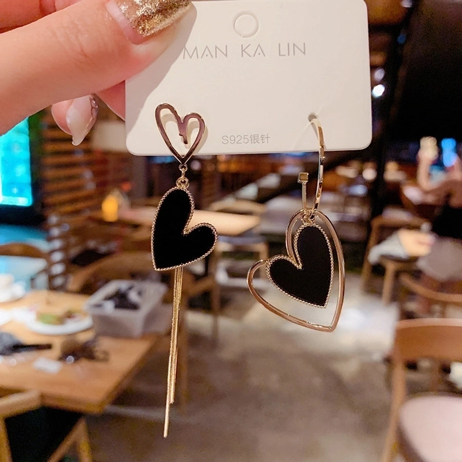 heart asymmetrical tassel