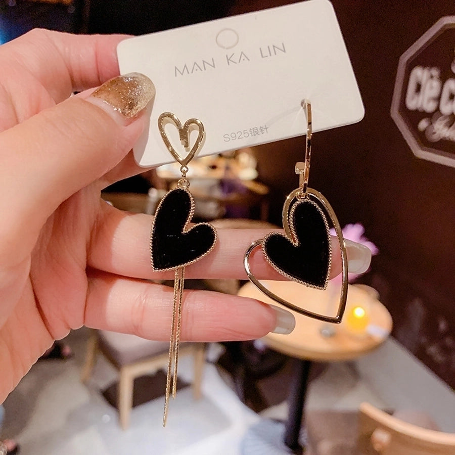 heart asymmetrical tassel