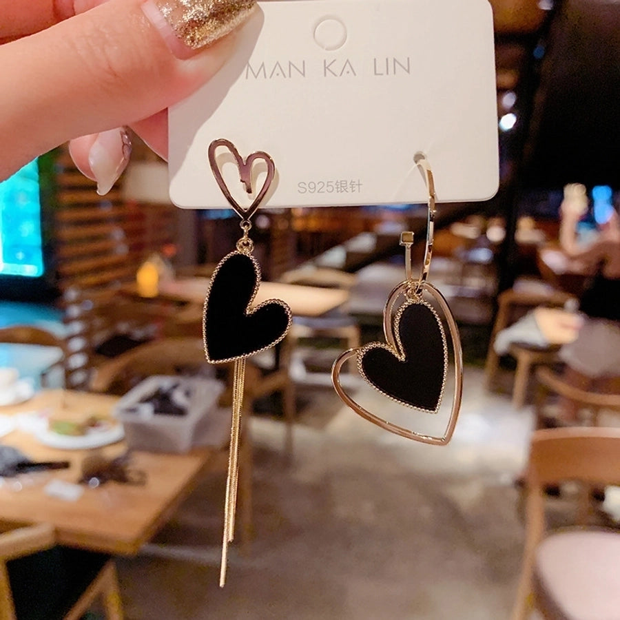 heart asymmetrical tassel