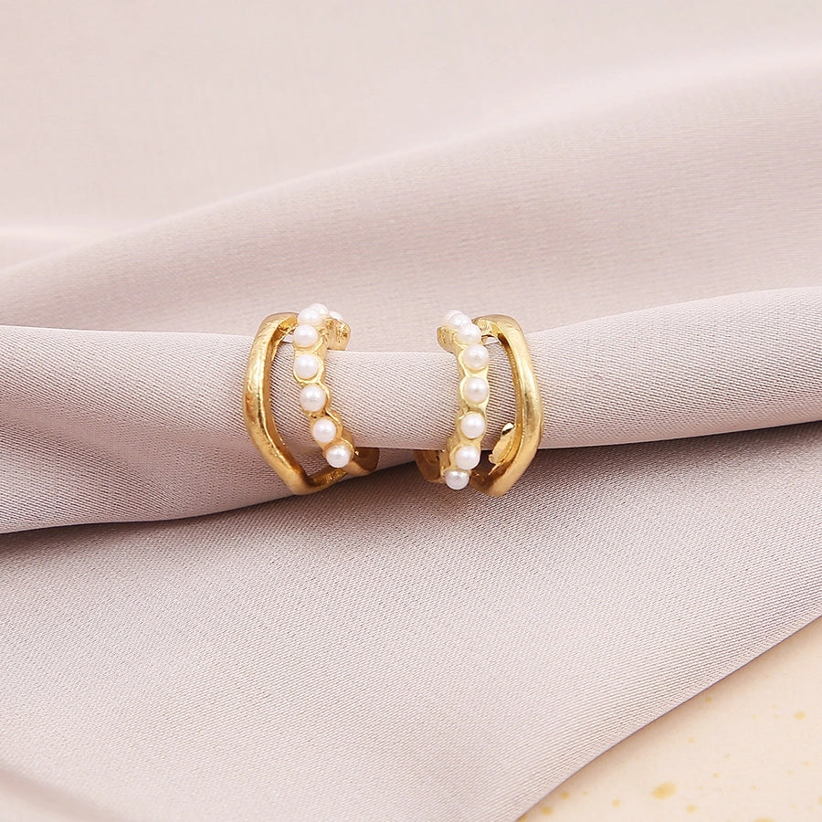 geometric pearls ear